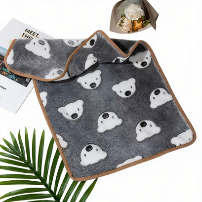 Fleece pet mat, paw and bone pattern