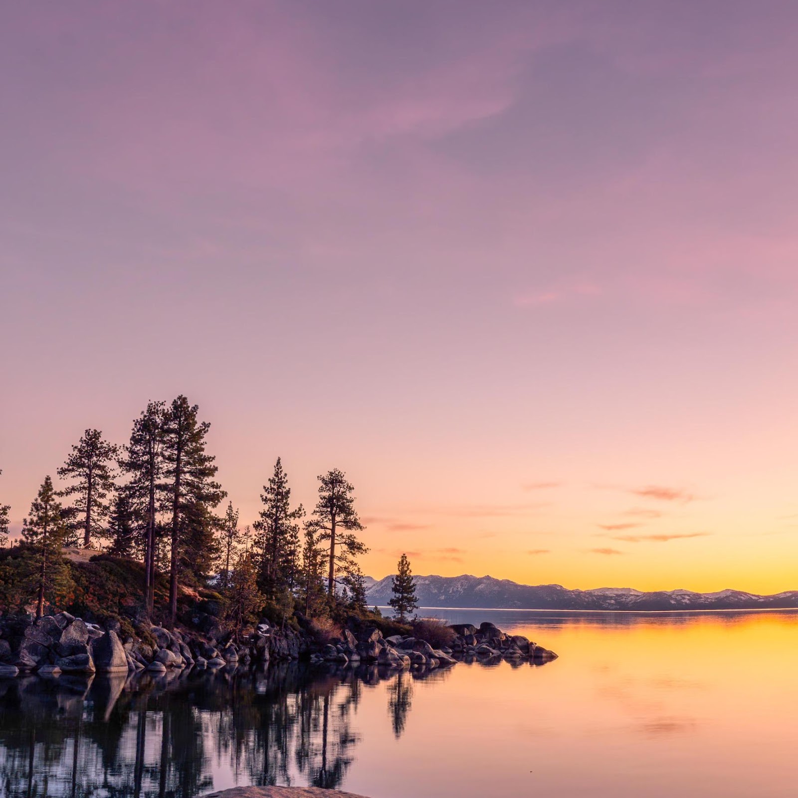 Download Peaceful Lake Sunset Rocks 2K iPhone