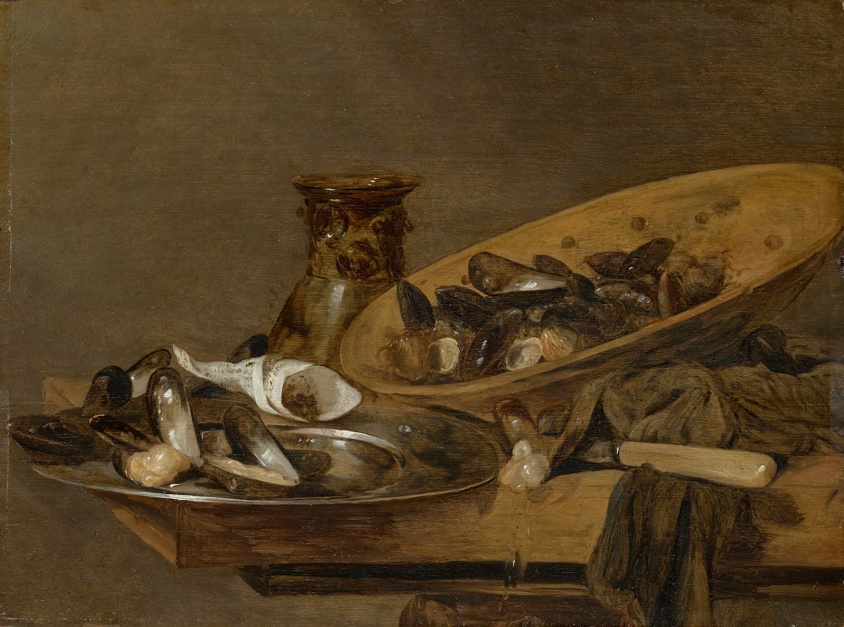 Mussels in pewter and earthenware plates with an upturned roemer on a wooden tab