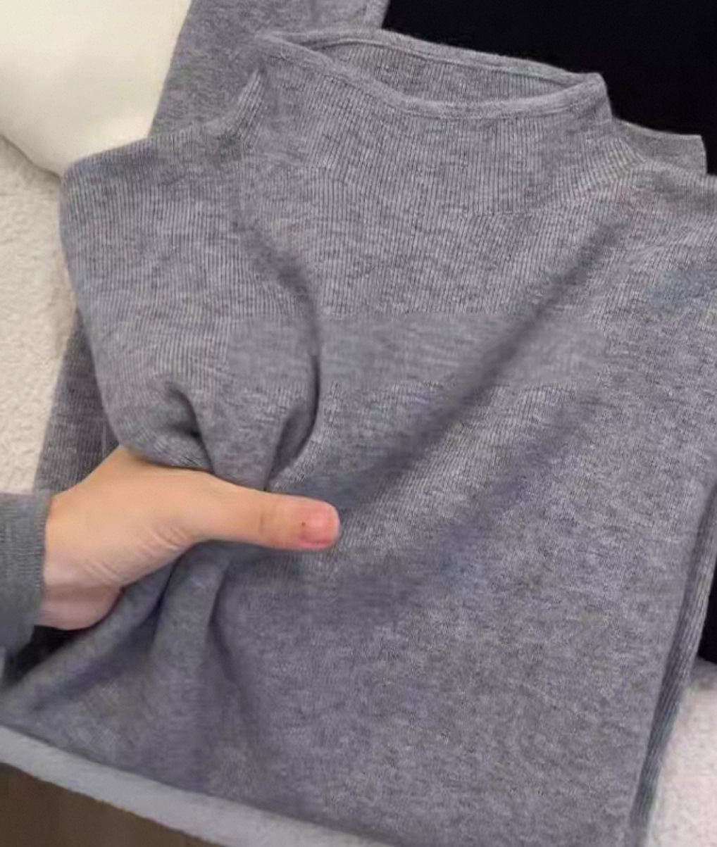 Women's knitted sweater with stand-up collar, ribbed