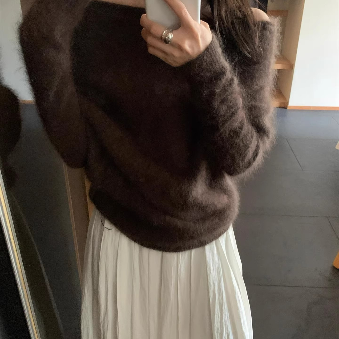 Women's knitted sweater with boat neckline, loose