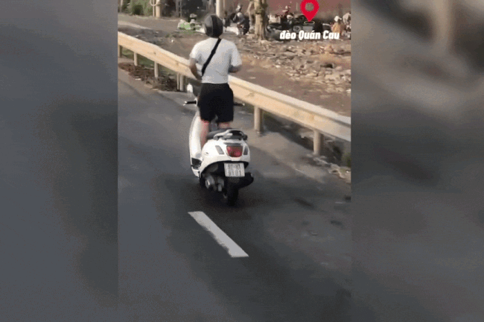 Clip: Thanh niên lái xe máy buông 2 tay trên đường đèo - Báo Tiền Phong