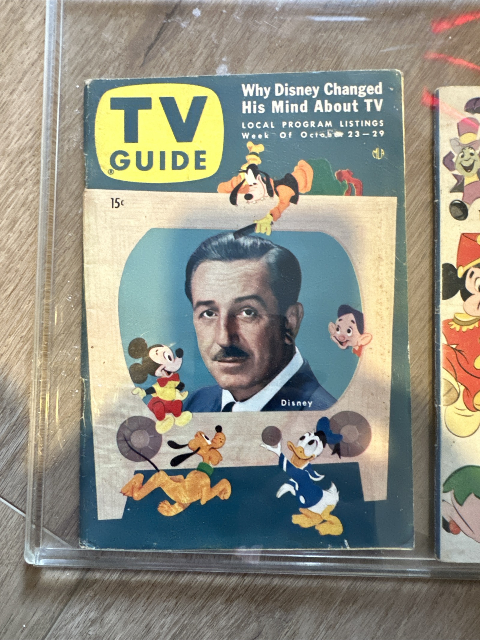 Original October 1954 TV Guide cover featuring Walt Disney portrait in a vintage TV frame surrounded by Mickey Mouse, Donald Duck, Pluto, Goofy, and Dopey on a dark teal background