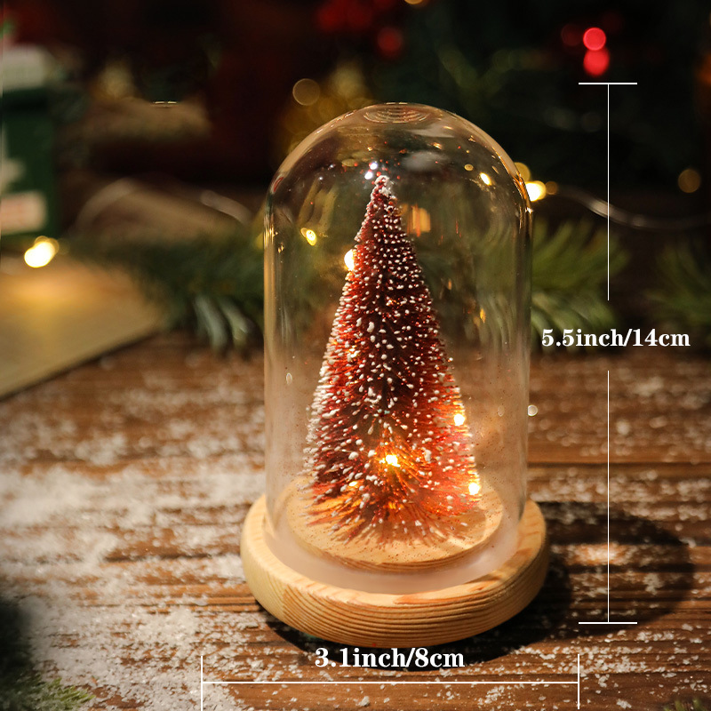 Lit wooden Christmas house for table decoration