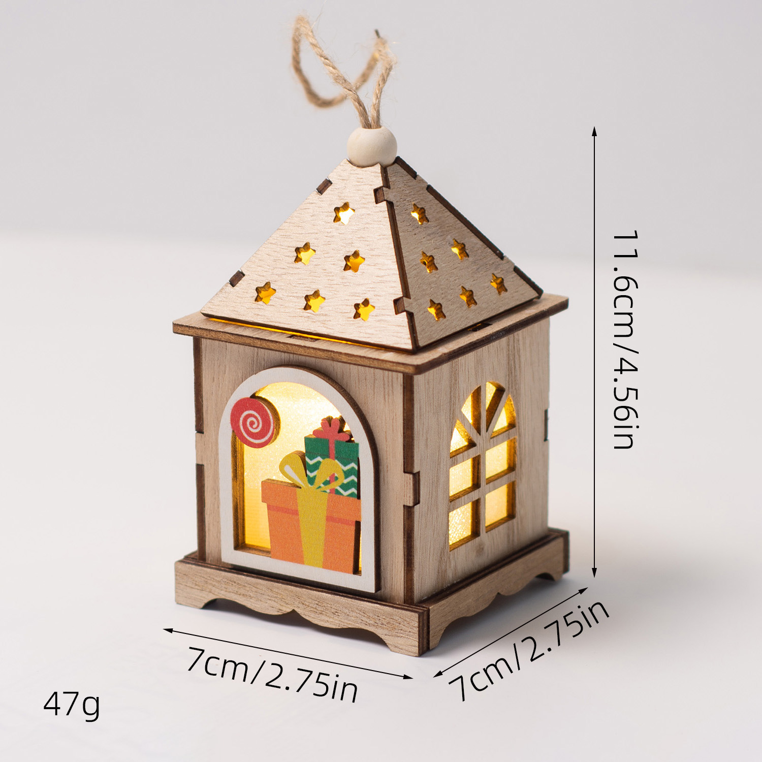 Illuminated wooden house as Christmas decoration