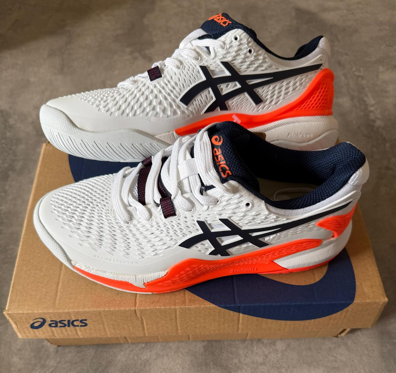 ASICS RESOLUTION 9 BLANCA CON NARANJA Y AZUL