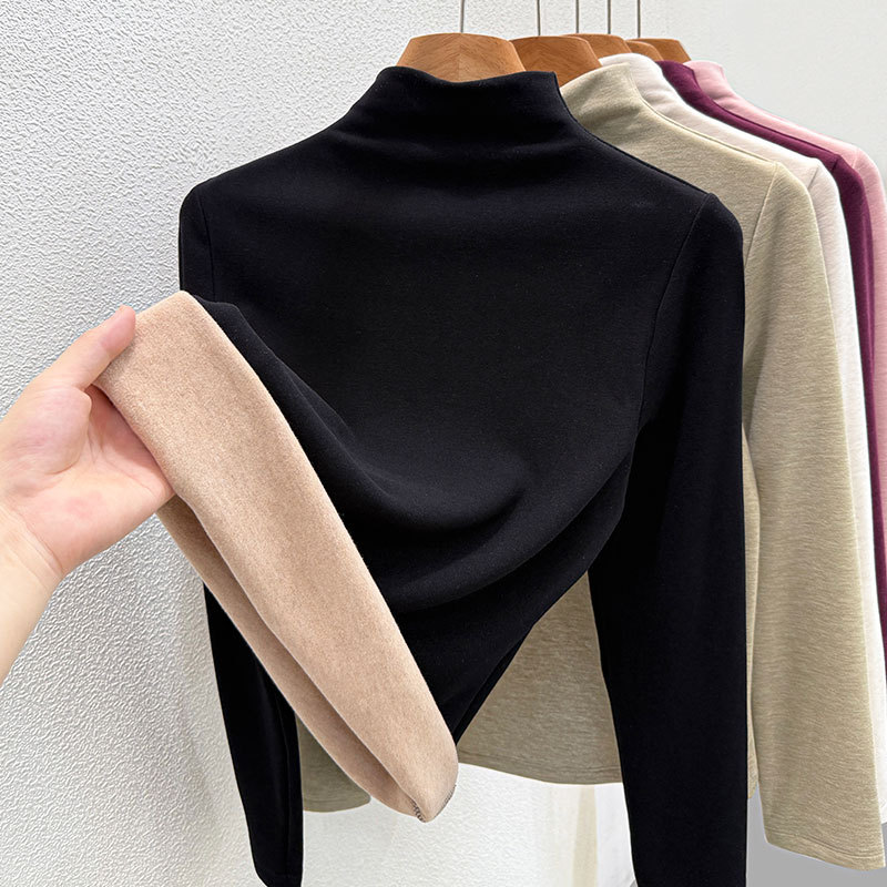 Wool-blend turtleneck sweater with thermal lining