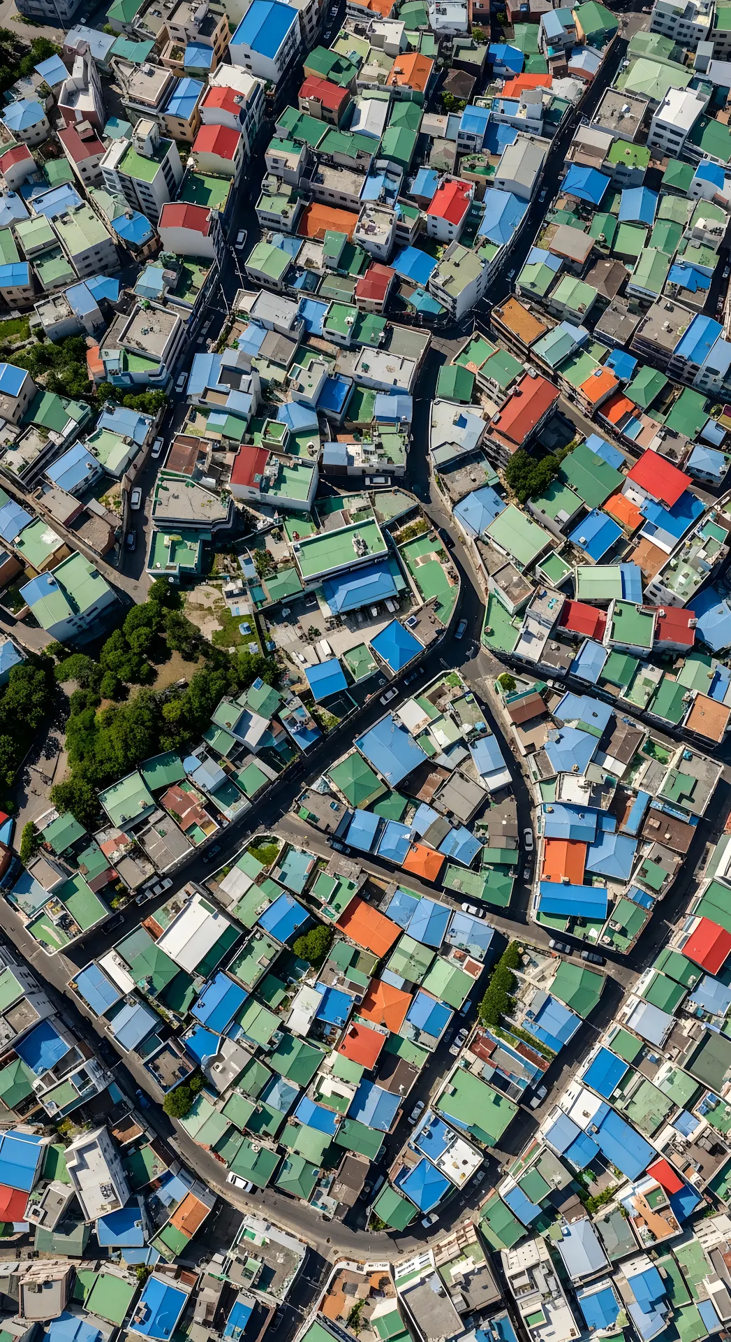 Dense Urban Landscape Aerial with Brightly Colored Rooftops - Free 4K mobile Wallpaper