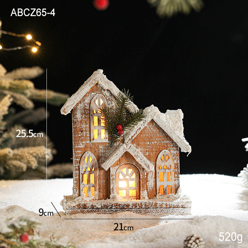 Lit wooden Christmas house in European retro style