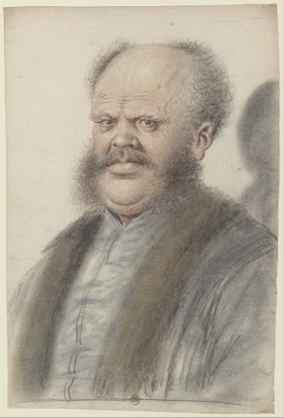Homme au crâne dégarni portant moustaches et larges pattes de cheveux descendant