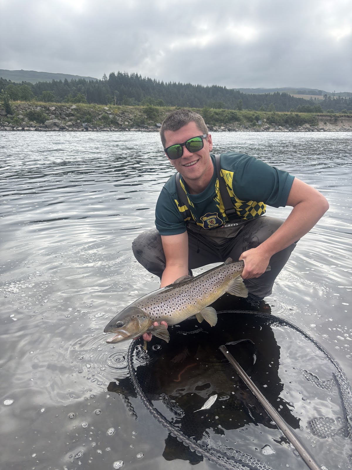 Jude Smyth with a Sea Trout caught at Lower Kinnaird on the River Tay