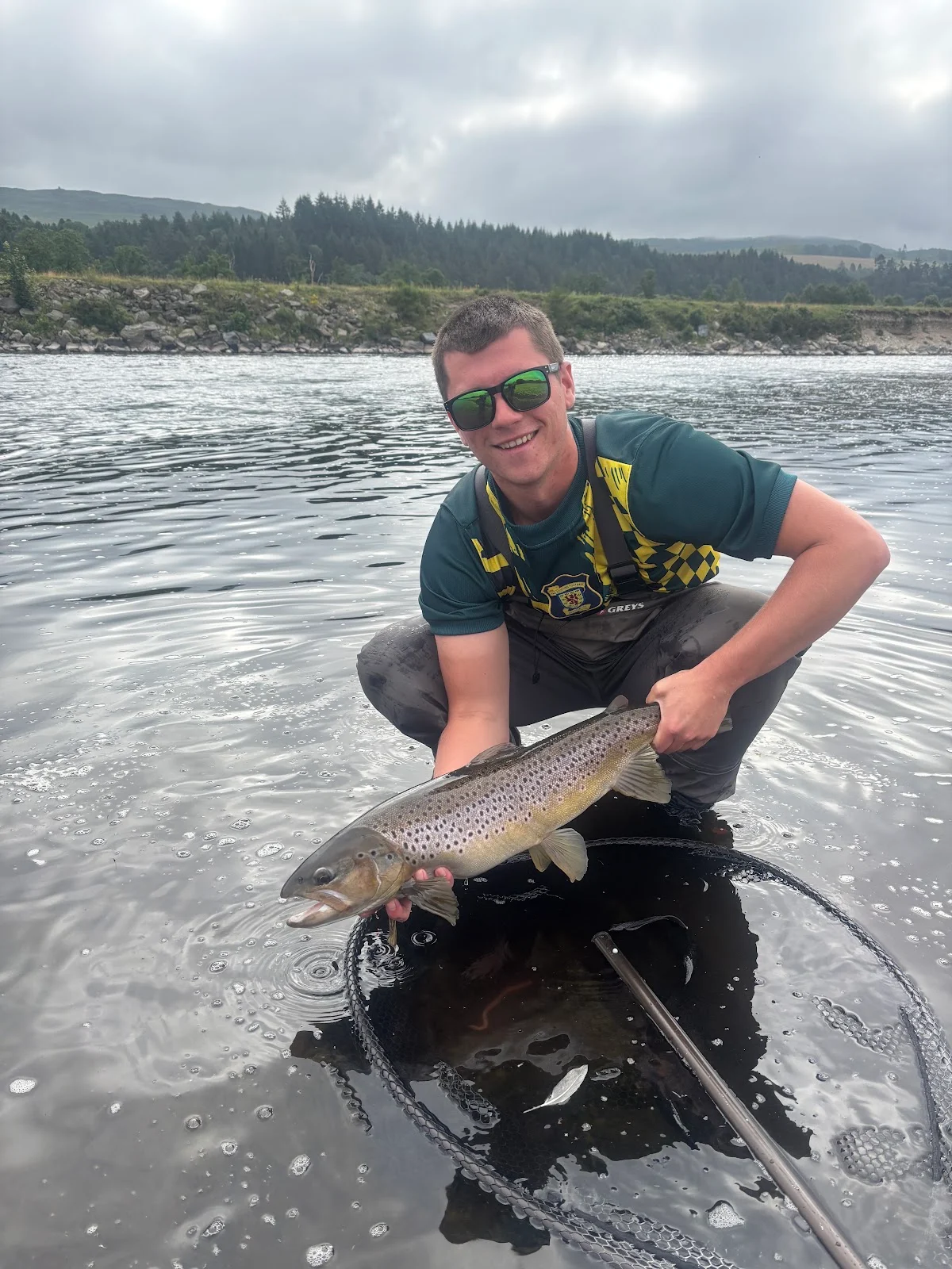 Jude Smyth with a Sea Trout caught at Lower Kinnaird on the River Tay