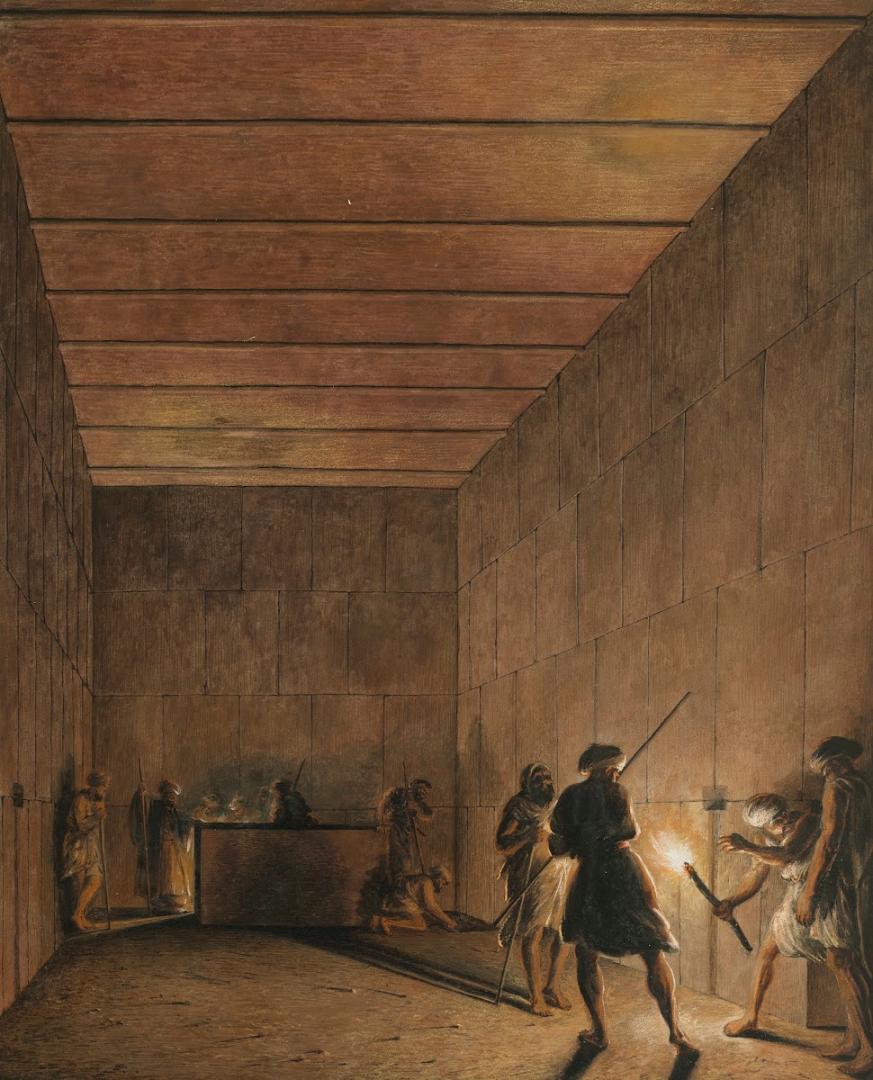 Arab men discovering an ancient tomb