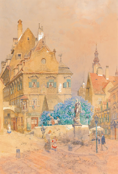 A corner of a street with a lilac bush and the statue of a Madonna