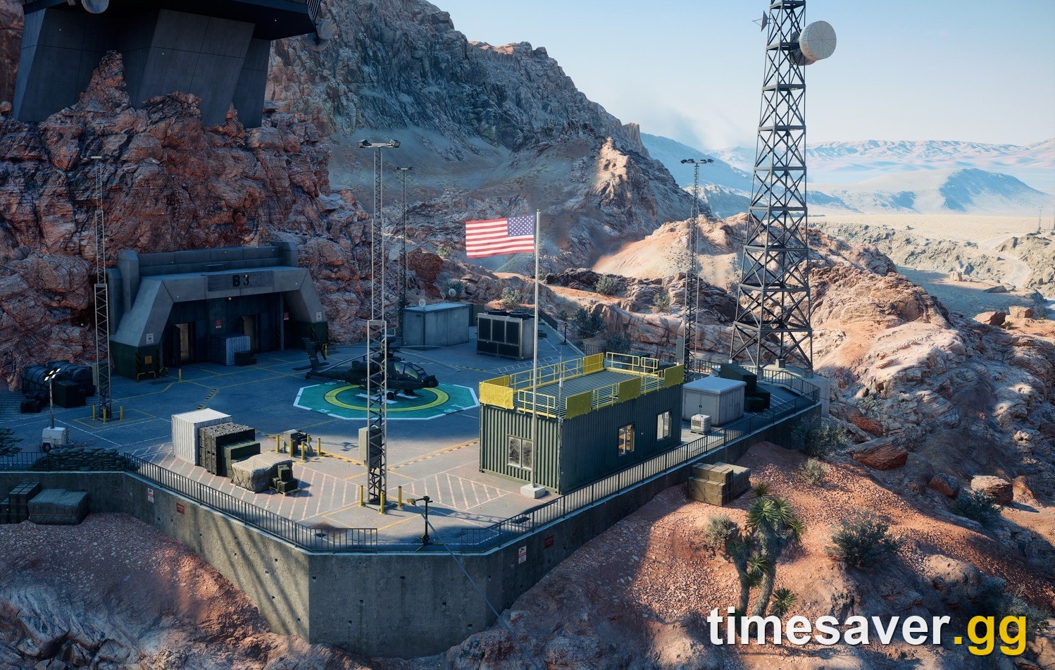Battlefield 6 Area 51 Helipad objective built into the mountainside with a radio mast, the elevated overwatch position EA flags for Recon players