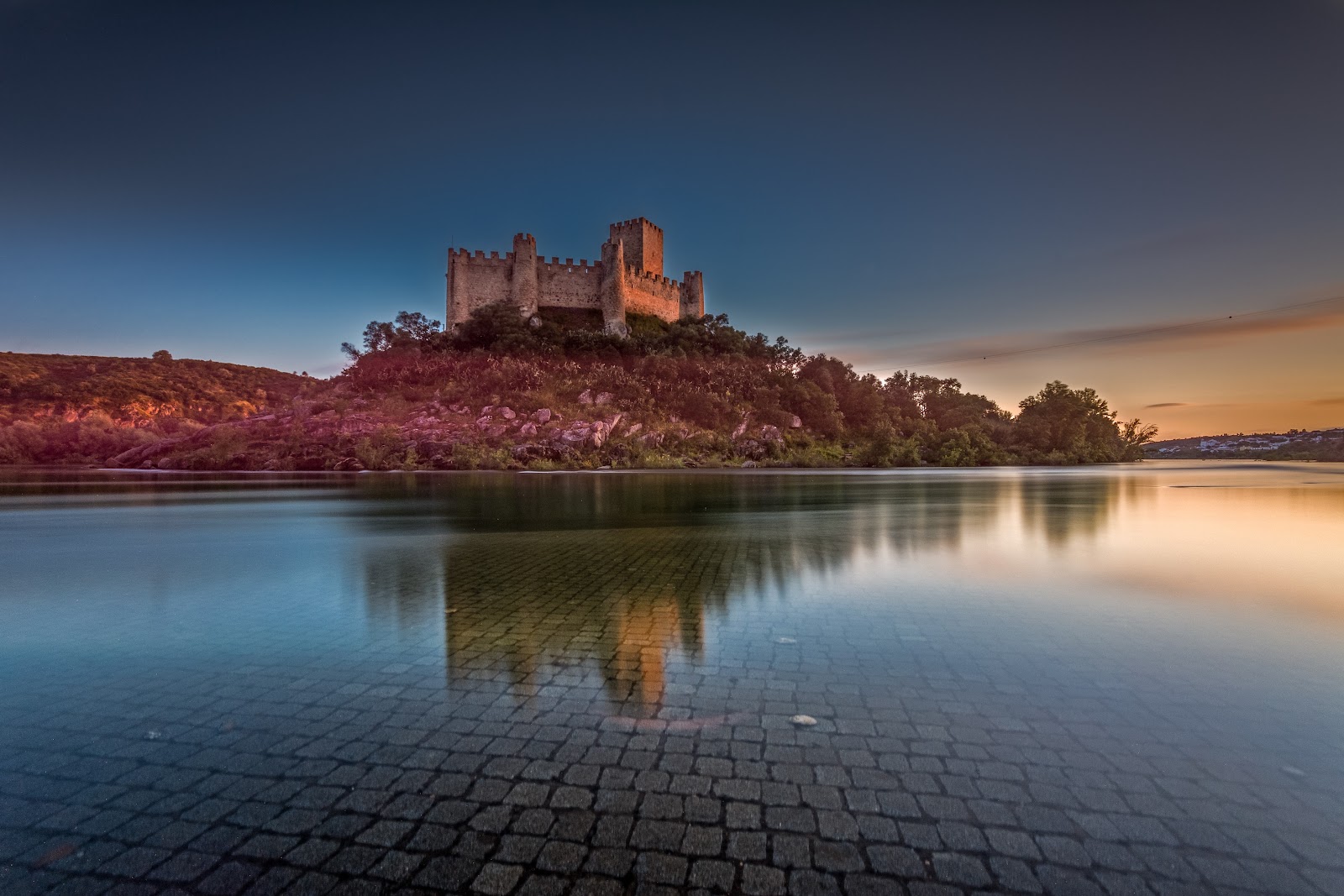 4-Day Journey: Templar Tomar, Ancient Evora, Nazare's Coast