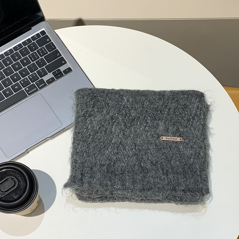 Knitted scarf from alpaca wool blend, fashionable