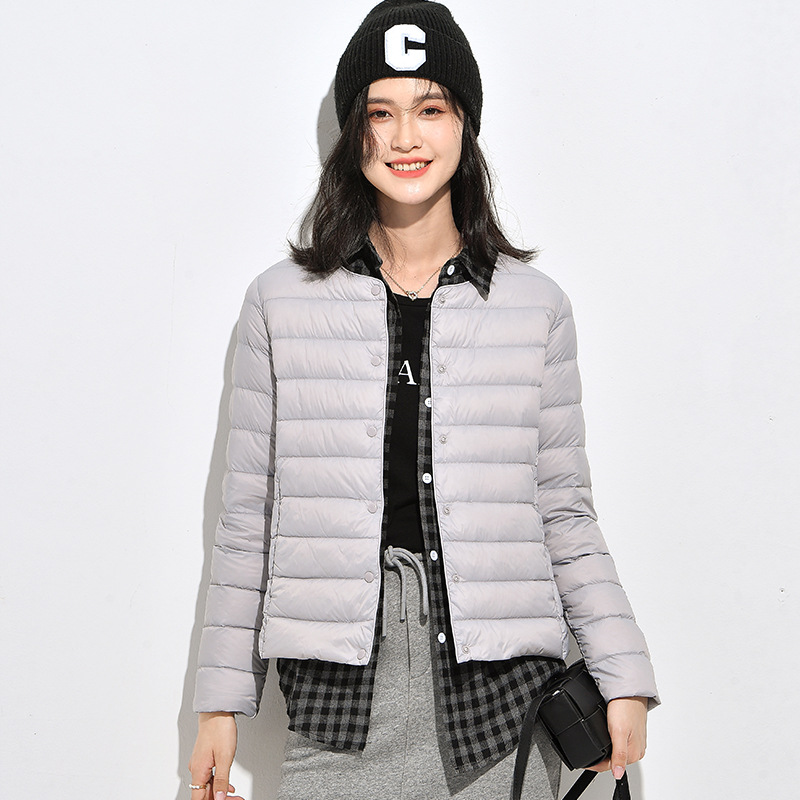 Lightweight ladies' down jacket, short, as an underlayer