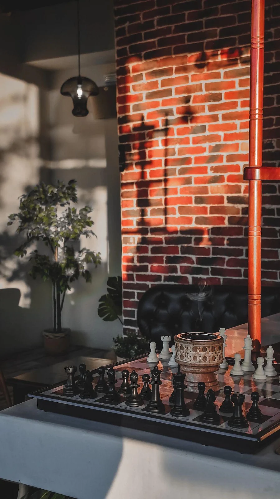 Chessboard by a Brick Wall - Interior Photography iPhone Wallpaper (1080x1919)