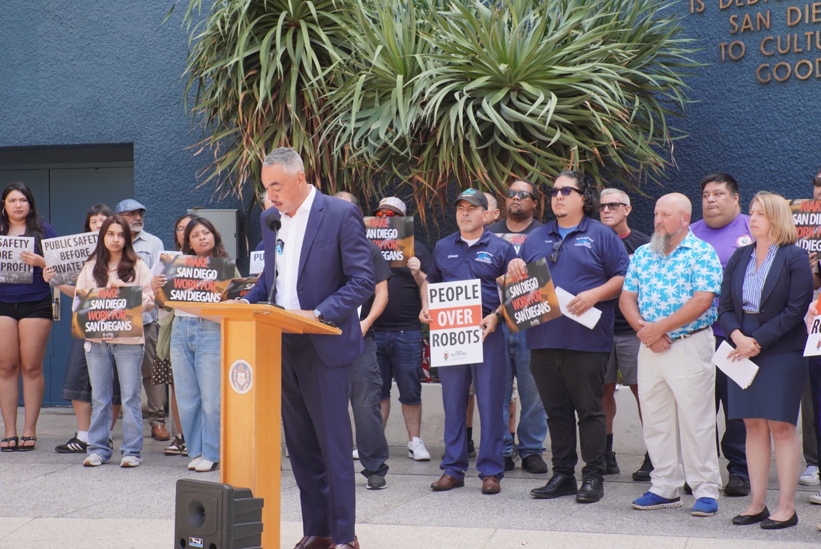 Council President Sean Elo-Rivera speaking with drivers and community representatives