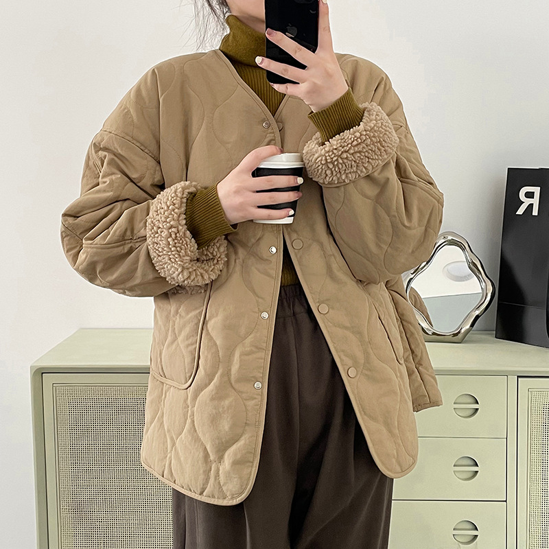 Women's quilted jacket with lambskin inserts and V-neck