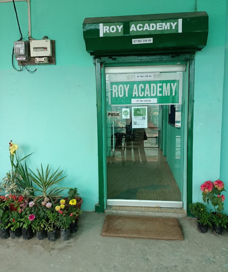 Students celebrating achievement at Roy Academy coaching centre Naharlagun