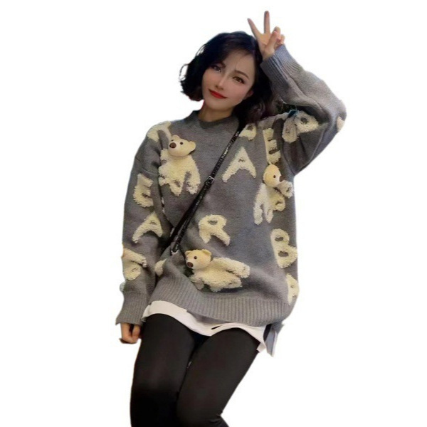 Soft knitted sweater with detachable bear motif