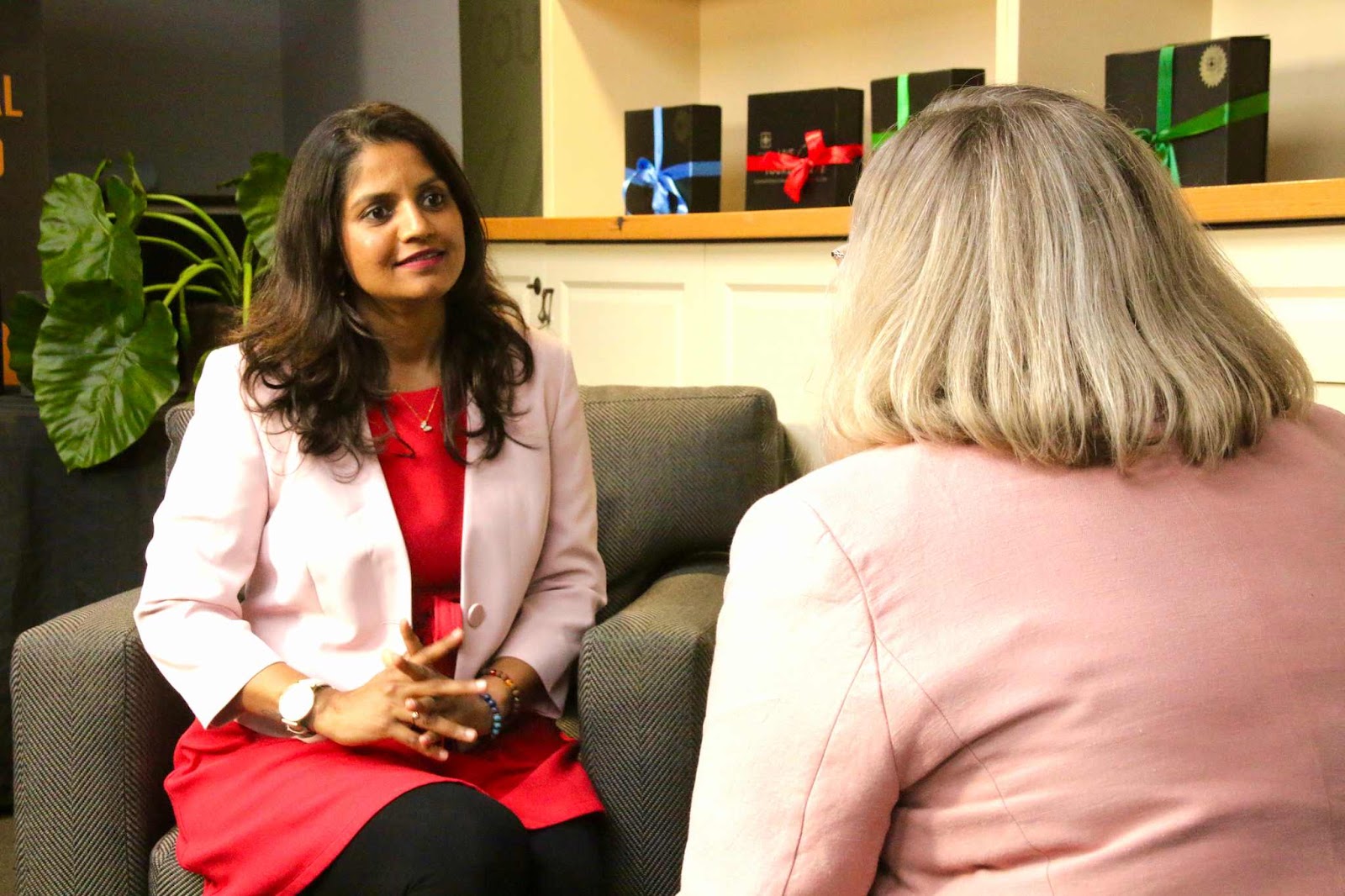 Preethi warmly connecting with a client