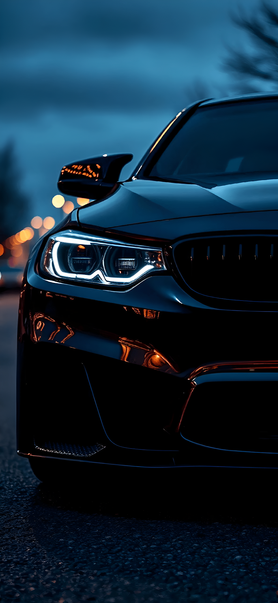 Aggressive Black Luxury Sports Car Headlight Close Up at Dusk - Free 4K mobile Wallpaper