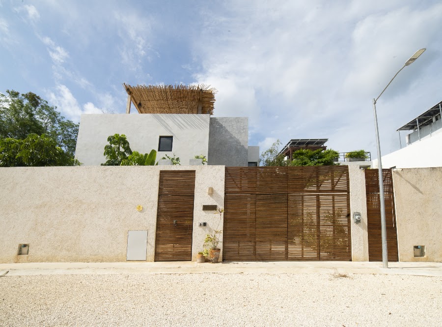 Chukum facade and wooden entrance gate