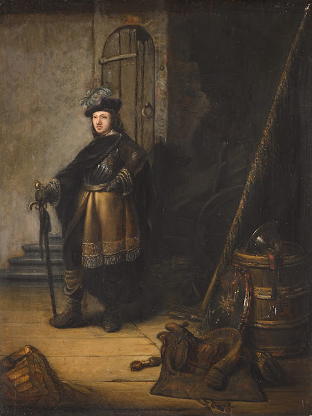 An officer standing in a guardroom before a doorway