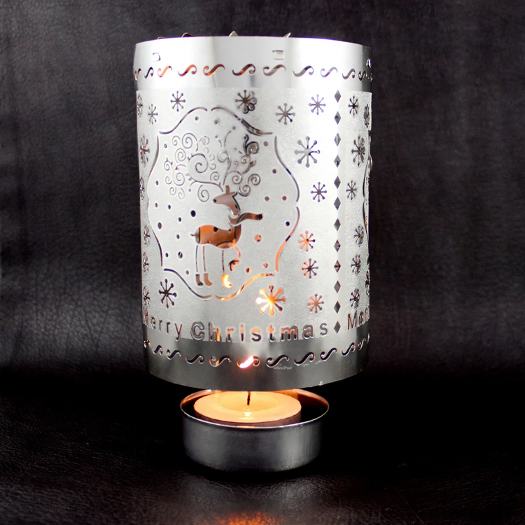 Rotating brass tea light holder, perforated design
