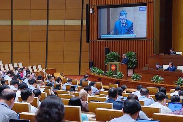 Bộ trưởng Bộ Tài chính trình bày Tờ trình về quyết toán ngân sách nhà nước năm 2024 - Báo Kiểm Toán