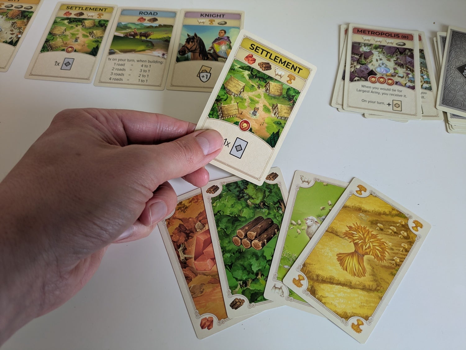 Portada de Catan: El juego de cartas 2026 — imagen 3