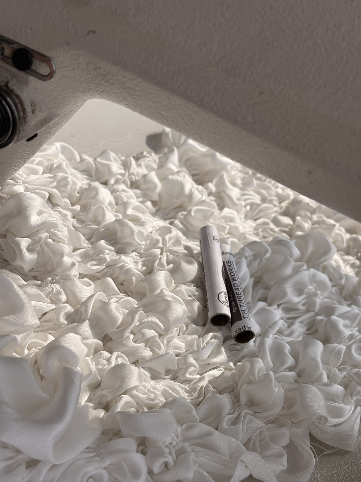 Close-up of a gathered textile surface being developed