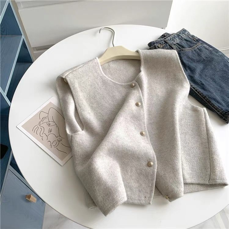 Women's knit pullover with stand-up collar, solid color