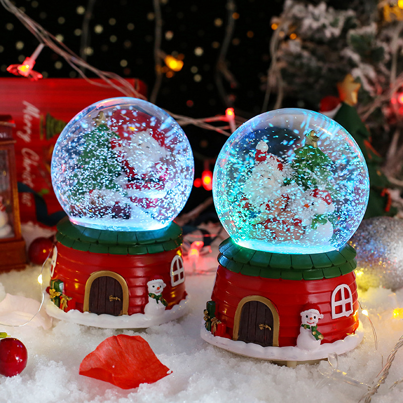 Weihnachtliche Schneekugel mit Musik und Licht