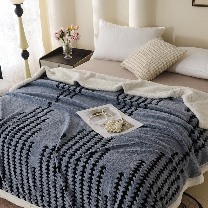Double-layered living blanket with lamb fleece look