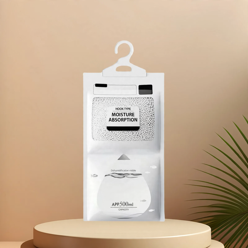 Hanging dehumidifying bag for wardrobes