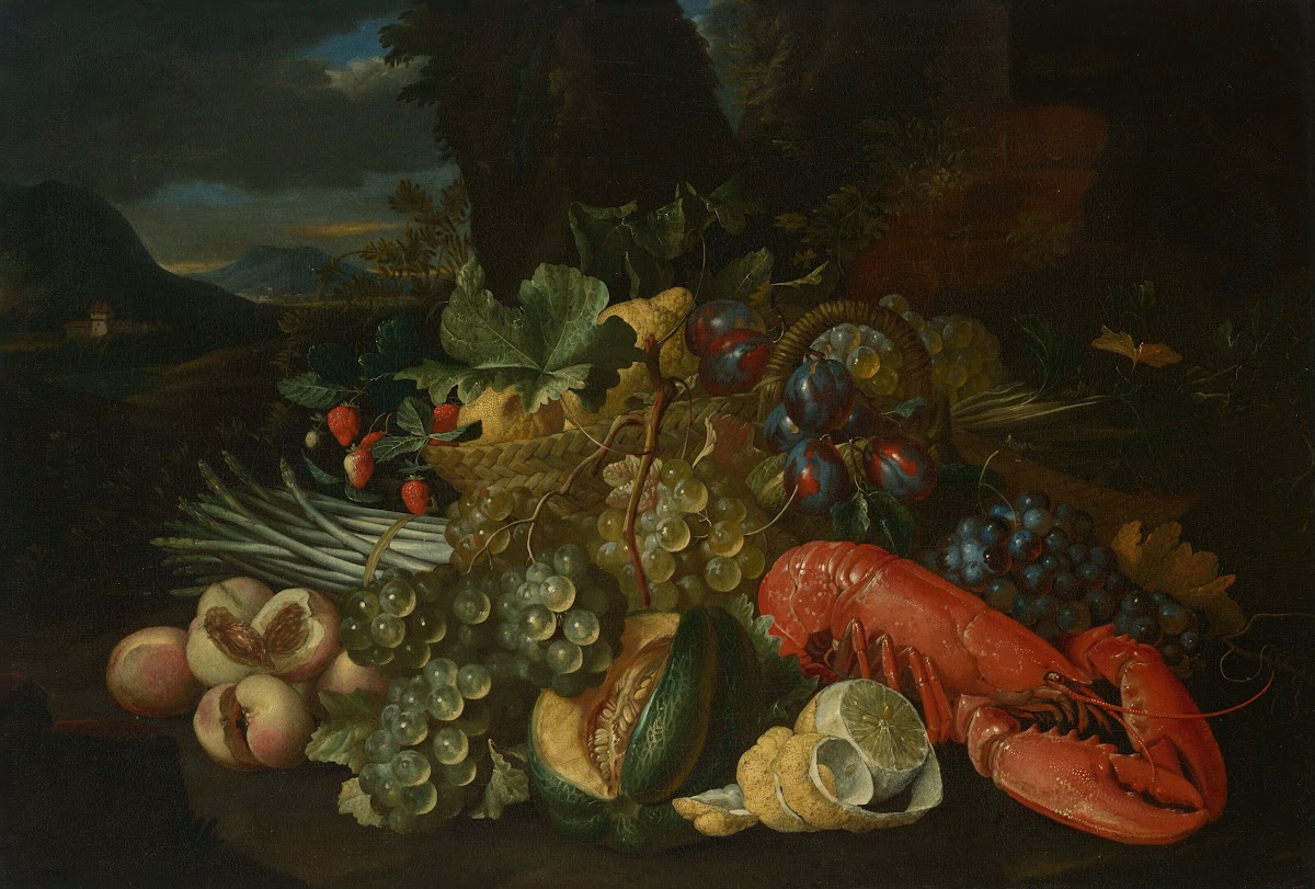 A basket of lemons asparagus peaches a melon plums grapes and other fruit with a