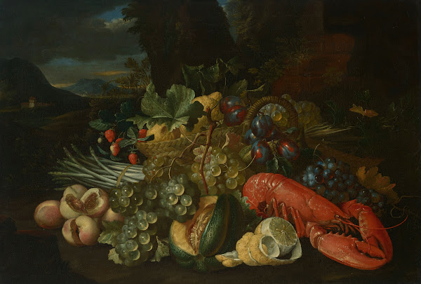 A basket of lemons asparagus peaches a melon plums grapes and other fruit with a