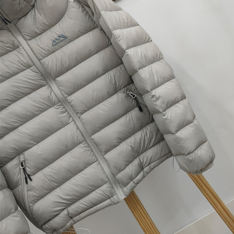 Light ladies down jacket with hood, quilted