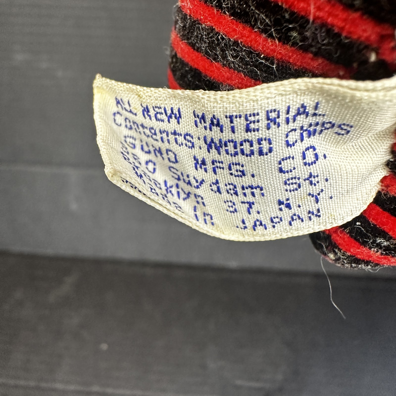 Vintage Gund Disney character plush toy of Mickey or Minnie Mouse, circa 1950–1963, with wood chip stuffing and original hang tag, made in Japan