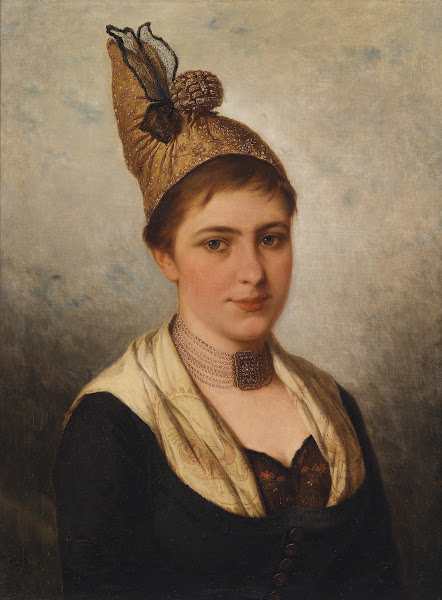 Junge Frau in Tracht mit Goldhaube
