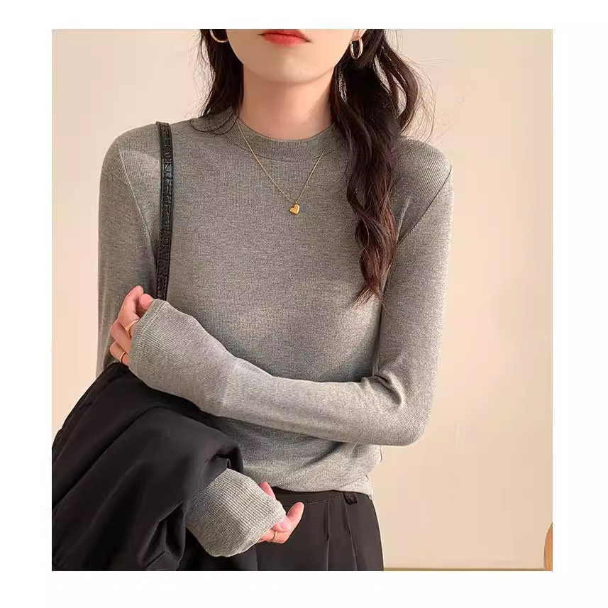 Women's knit shirt with stand-up collar