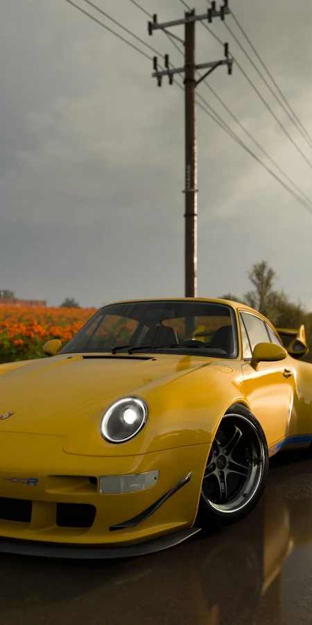 Yellow Porsche On Wet Road 4K Phone Wallpaper