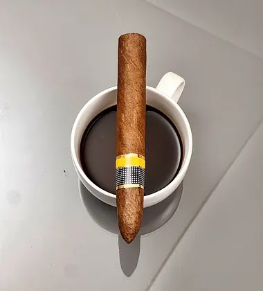 Puro premium con café espresso — maridaje clásico
