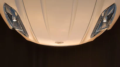 Aston Martin Sports Car Hood 4K Desktop & Mobile Wallpaper Background