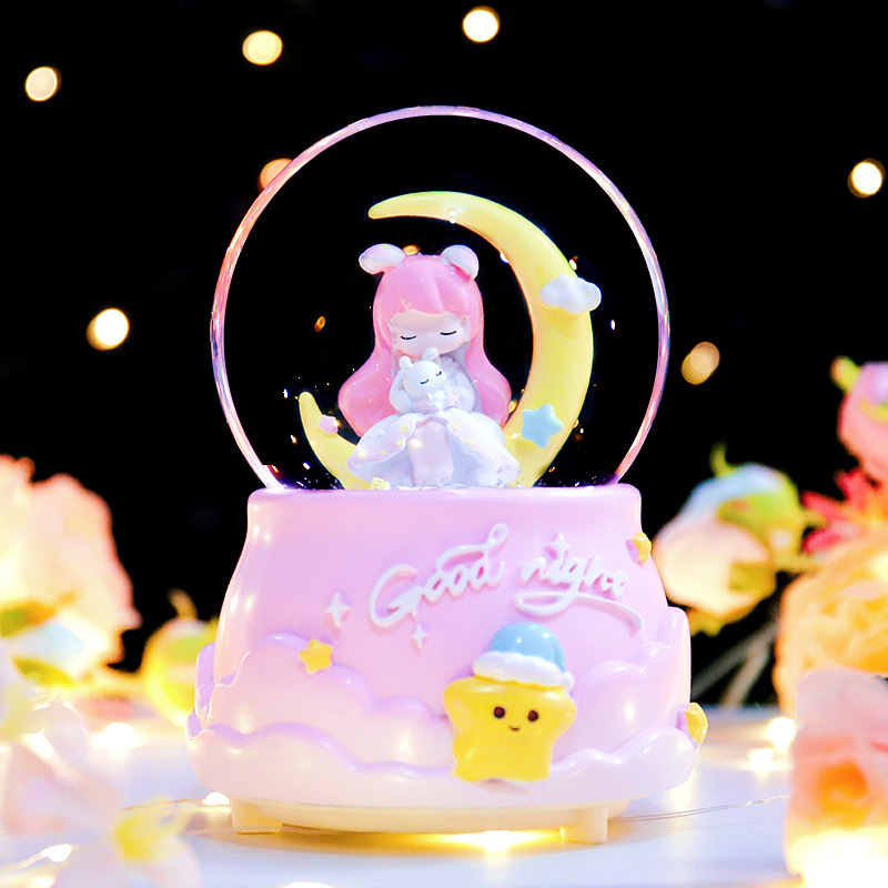 Spieluhr-Schneekugel mit Licht und Musik