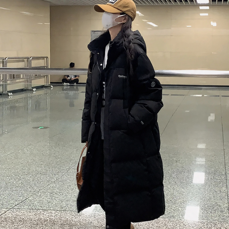 Long padded women's winter coat, loosely cut